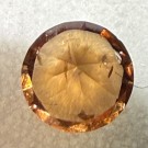 Zirkon meget sterk orange farge og kraftig refleksjon 2,7ct og 8,3 m i diameter  thumbnail
