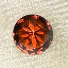 Zirkon med dyp rød farge og sterk refleksjon ø 8 mm i diameter 3,2 ct thumbnail