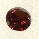 Zirkon med dyp rød farge og sterk refleksjon. Denne måler ø 9,5 mm og veier 3,9 ct  thumbnail