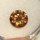 Zirkon meget sterk orange farge og kraftig refleksjon 2,7ct og 8,3 m i diameter  thumbnail