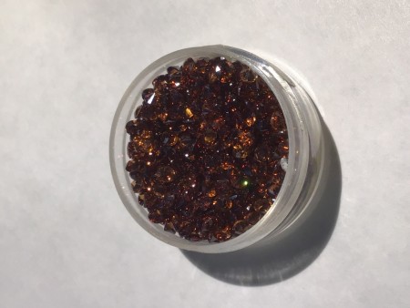 Zirkon mørk orange farge. diameter ø 2,5